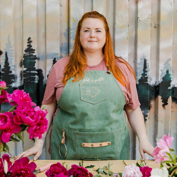 Foto einer Einzelunternehmerin: Auch Gewerbetreibende und Freiberufler müssen die Aufbewahrungsfristen für Geschäftsunterlagen einhalten